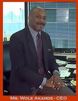 Mr. Wole Akande, CEO of Slowe Limited, seated at his office desk